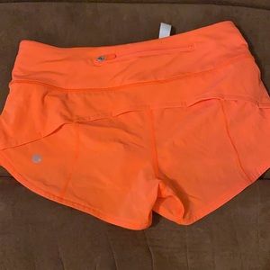 Lululemon size 2 2.5 inch. NEON ORANGE